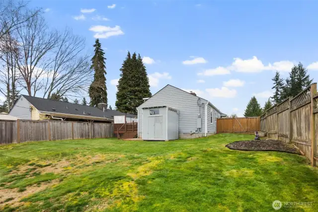 Get the full view of your fully-fence, gorgeous yard.