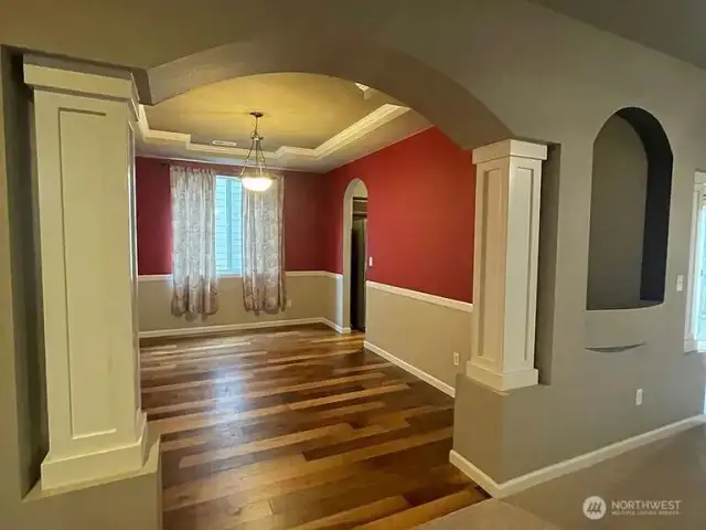 Kitchen Connects Seamlessly to a Separate Dining Oasis.