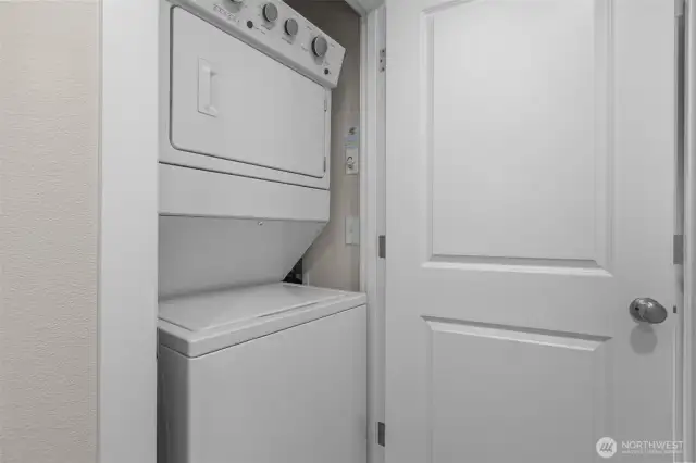 Washer and dryer easily accessible from both bedrooms.