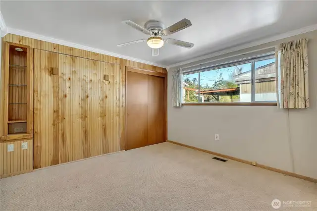 Primary bedroom with built in Murphy bed.