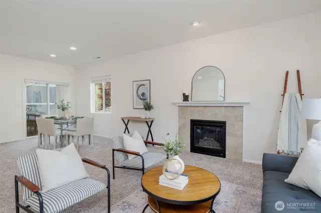 Looking towards the dining area and sliding back door out to the fully fenced yard & working hot tub.