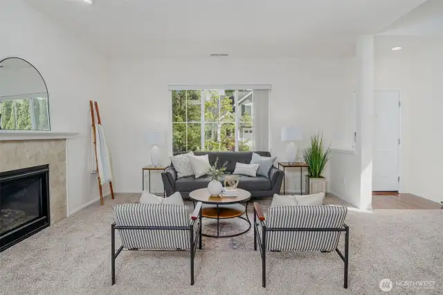 Looking from the dining area out to the front yard