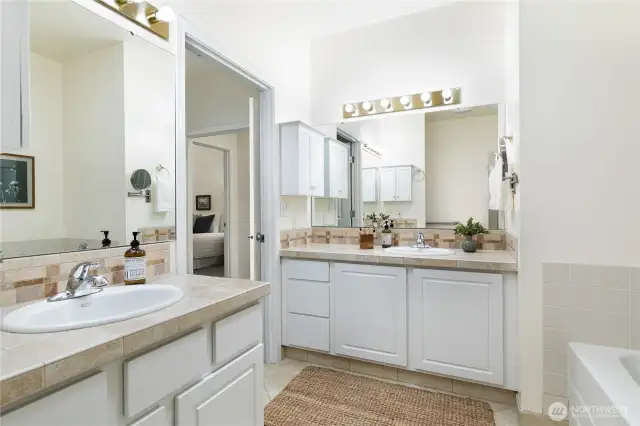 Dual sinks and vanities in Primary suite.