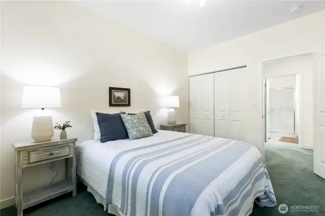 Full closet in secondary bedroom.