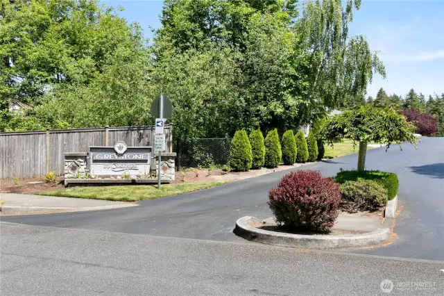 Entry to Greystone on Bridgeport condo community. Directly accross the street from this entry is easily access street parking for when garage/driveway is full!