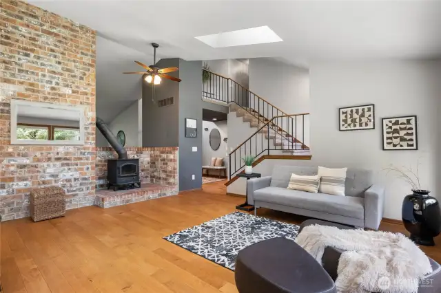 Wood burning stove in second living room next to the kitchen. Vaulted ceilings!