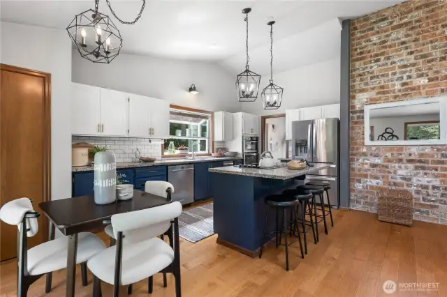 Enjoy stainless steel appliances, ample counter space, and a large island with seating for family and friends.