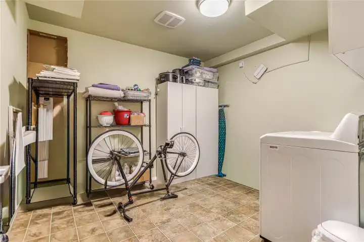 Laundry and storage area for downstairs