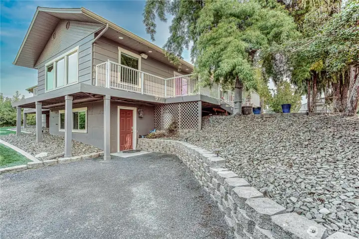 Separate entry to lower level living ~ currently rents for $2,000 per month ~ 2 bedroom 1 bath