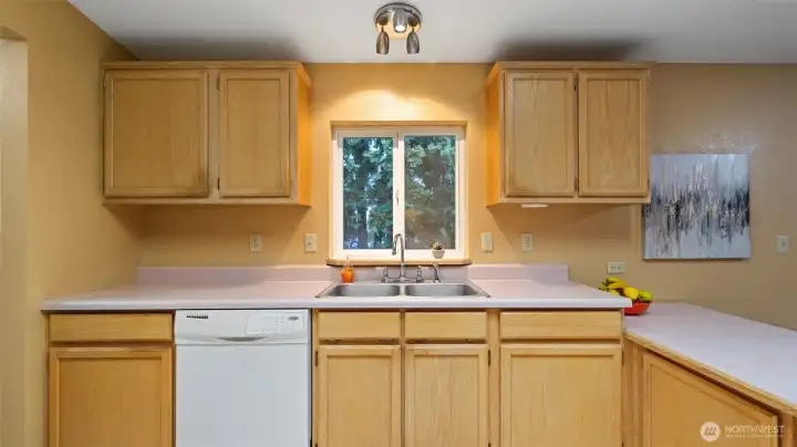 Tidy kitchen with skylights