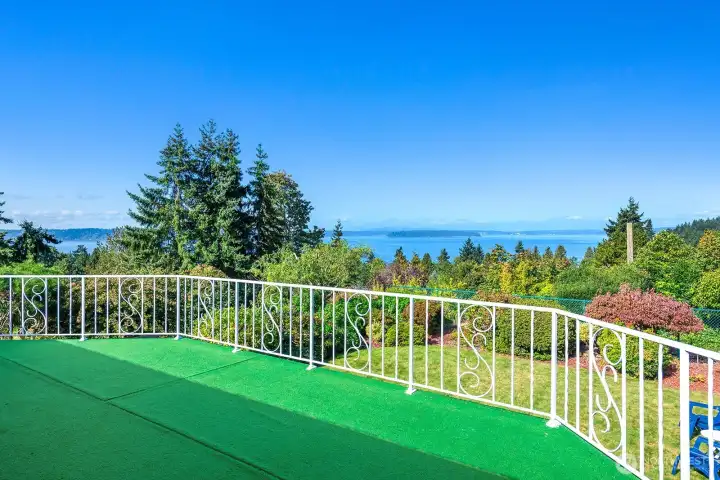 This deck can easily accommodate multiple seating areas and extends your living/dining space in good weather.