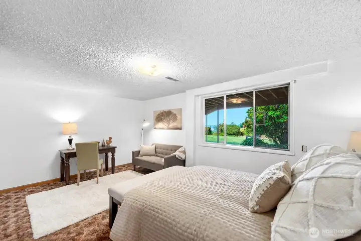 Very spacious 4th bedroom on the garden level with peek water view.