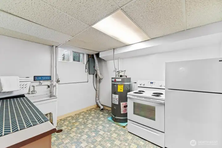 The laundry room has been used as an extra kitchen in the past.