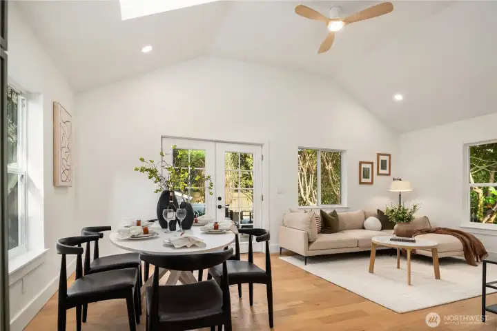 An overhead skylight adds to the natural light and a new designer ceiling fan is both functional and beautiful.
