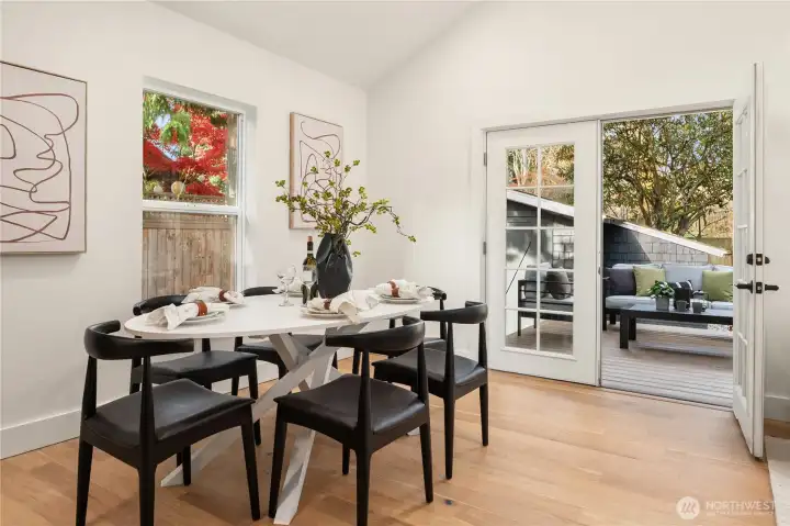 The double french doors open up to a fantastic barbecue deck and private outdoor dining.