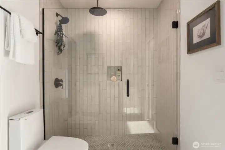 The oversized shower has an overhead rainfall shower head plus a fixed wall showerhead and finally, a handheld shower head.