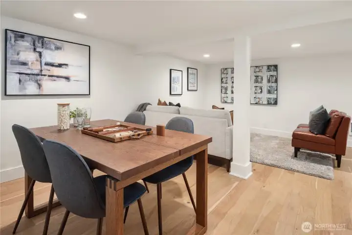 The spacious rec room features two lounge areas and room for hobbies and entertainment.