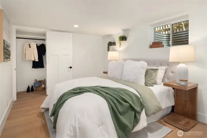 The third bedroom is large with a walk-in closet and exterior window.