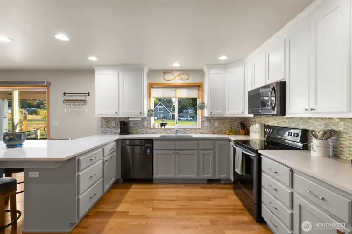 Updated chefs kitchen with modern finishes.