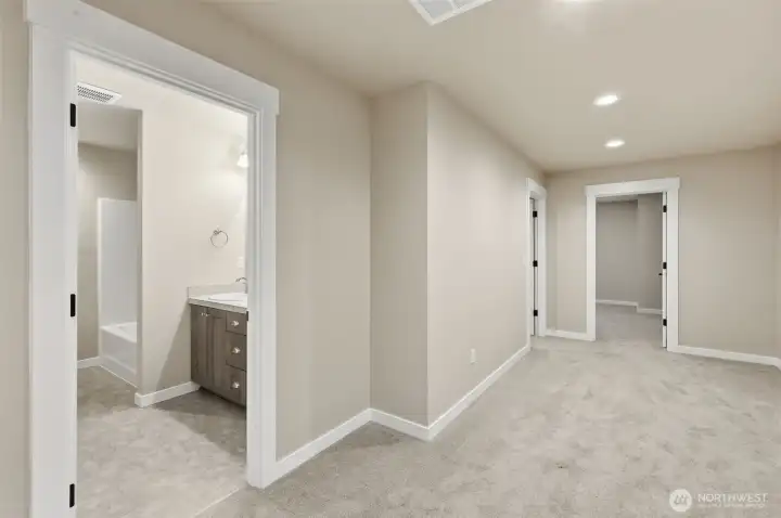 Flex space looking into the full bathroom upstairs.