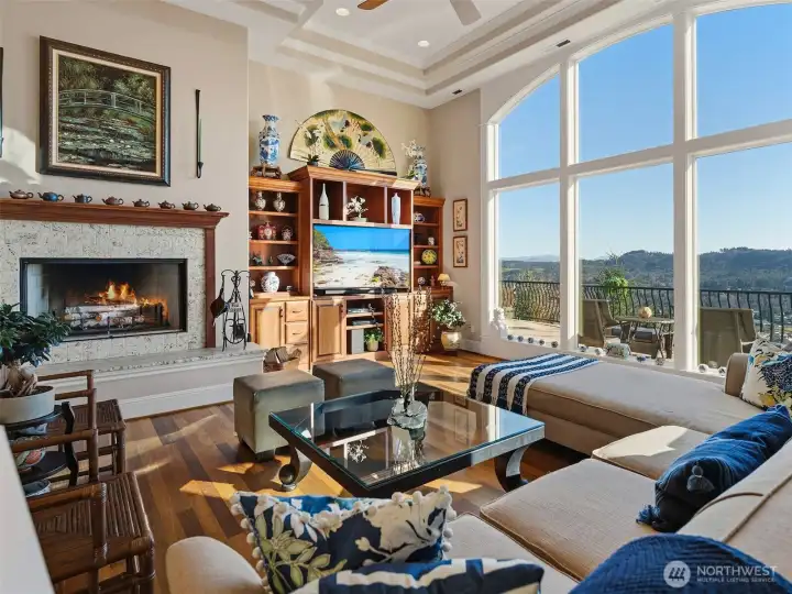 Great room with fireplace, wall of windows
