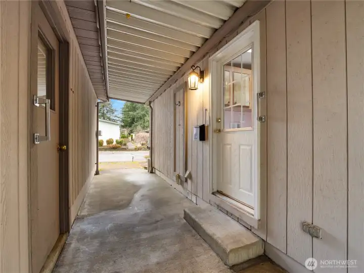 The protected breezeway and low threshold back entrance is great if you have mobility issues.