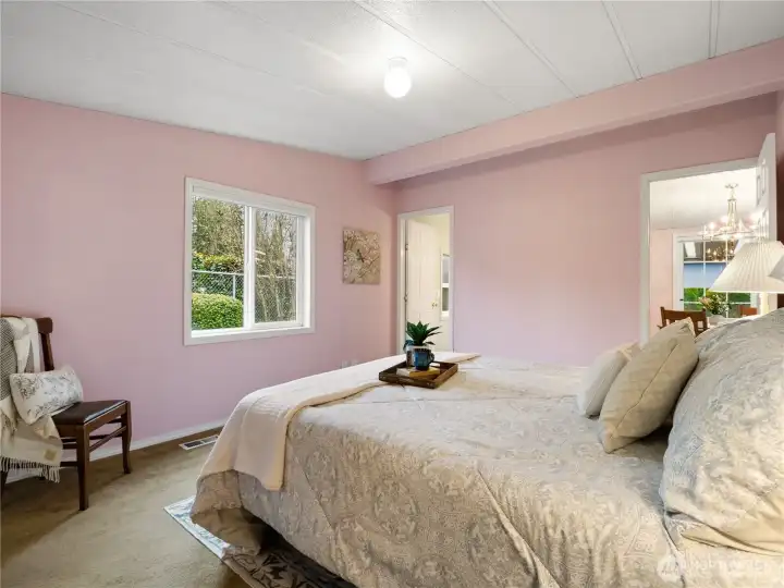 Wake up to a view of the private back yard.