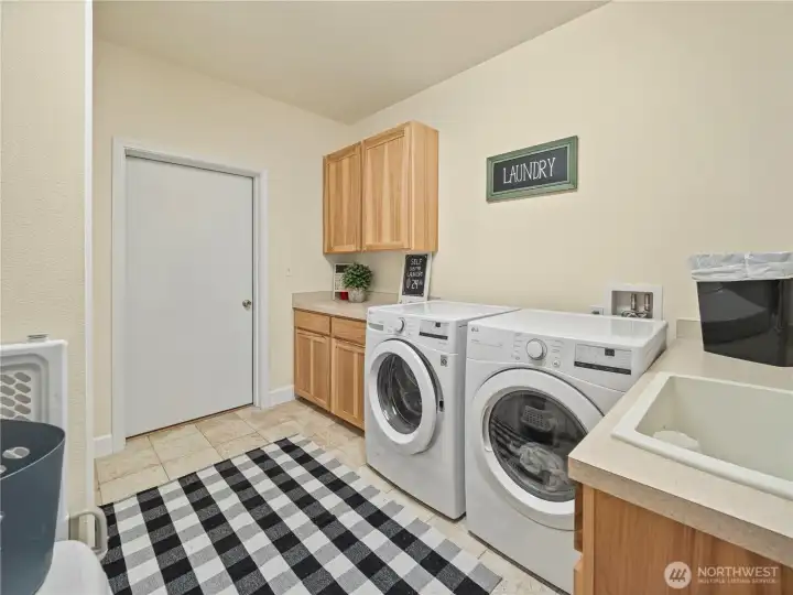Laundry/Utility room w/ garage access.