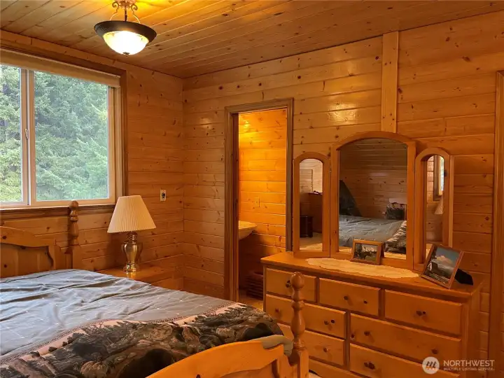 upper primary bedroom with half bath