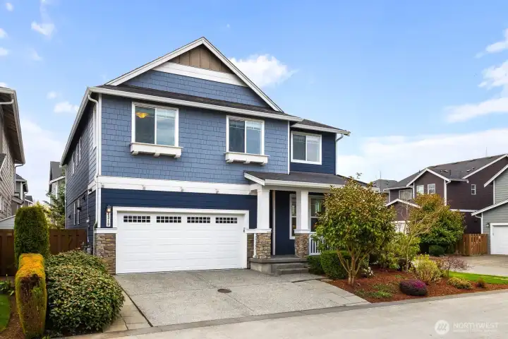 2 car garage, 2 additional spots in the driveway plus additional guest parking close by