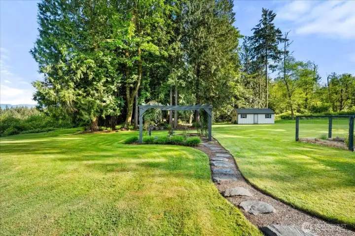 Organic garden and pergola added in 2022.