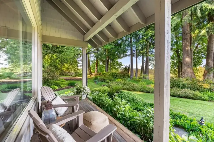 Covered porch perfect for year-round BBQs and entertaining.
