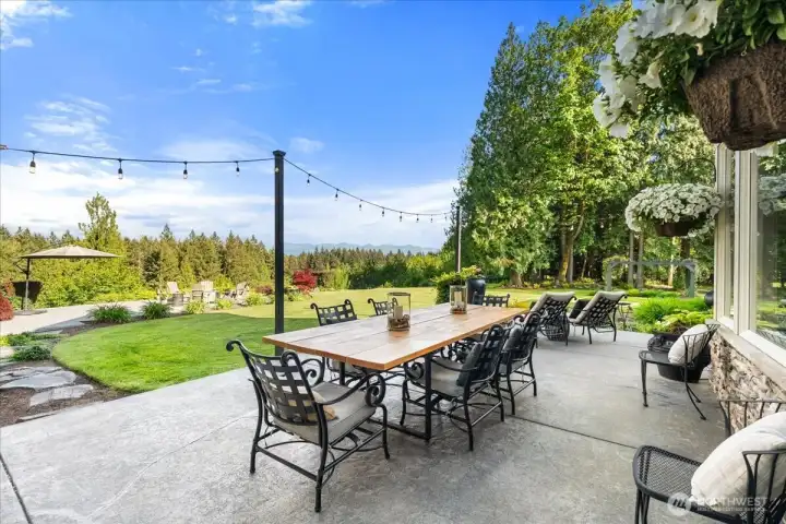 Expansive stamped concrete patio for entertaining.
