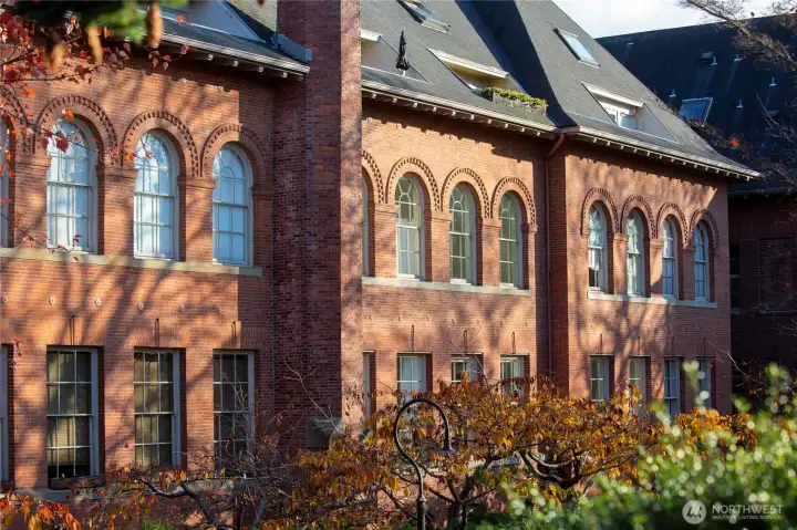 Rich brickwork, arched windows and handcrafted detailing speak to an era when civic architecture was designed to inspire permanence, pride and beauty.