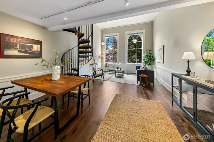 The open floorplan reflects modern living preferences while respecting the generous proportions established by the building's original classroom design.