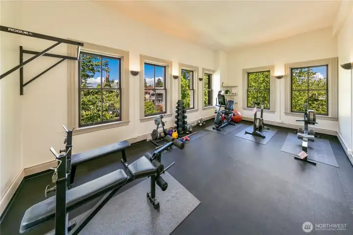 Originally classrooms and gathering spaces, portions of the historic building have been thoughtfully adapted to support contemporary living, including convenient fitness amenities for residents.