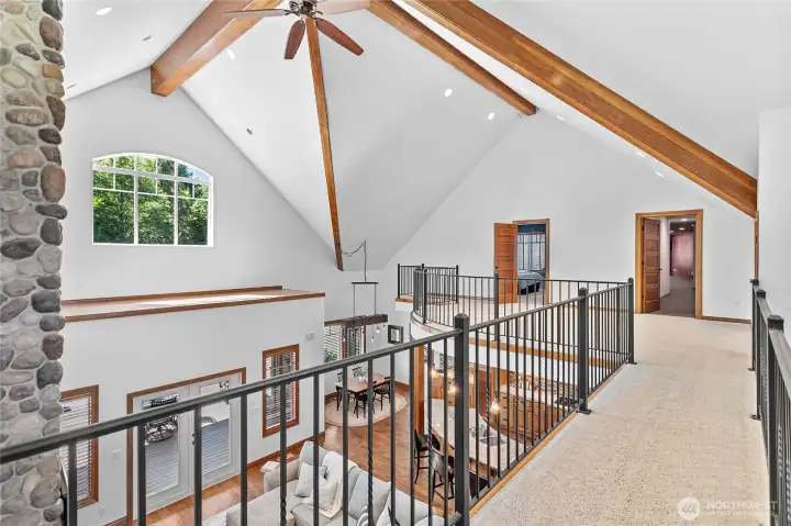 Upstairs loft area leads to the 4th bedroom and huge bonus room Upstairs loft area leads to the 4th bedroom and huge bonus room