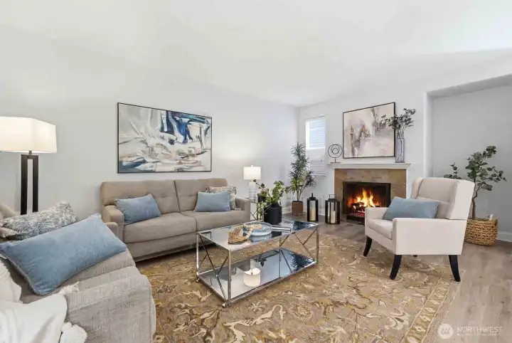 Comfortable and beautifully styled family room anchored by a warm, glowing fireplace. Comfortable and beautifully styled family room anchored by a warm, glowing fireplace.