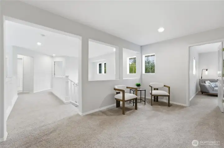 Large upstairs landing that works beautifully as a reading area, play space, or flexible bonus zone. Photo shows two bedrooms (#'s 2 & 3)) to the left and a bathroom plus the bonus room to the right. Large upstairs landing that works beautifully as a reading area, play space, or flexible bonus zone. Photo shows two bedrooms (#'s 2 & 3)) to the left and a bathroom plus the bonus room to the right.
