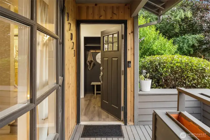 A welcoming first impression, covered, and perched above the street.