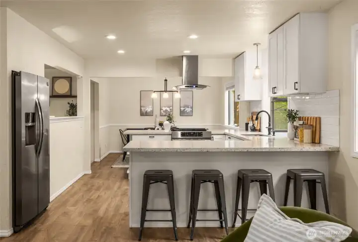 The wraparound kitchen offers an abundant workspace