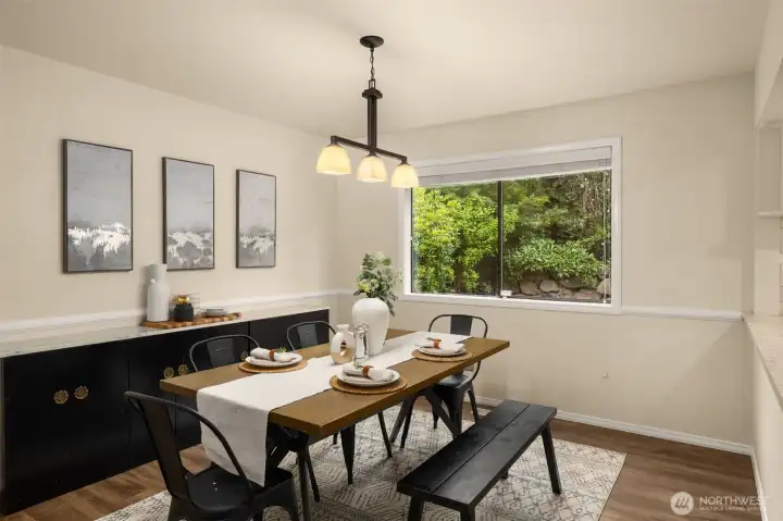 The dining room brings everyone together while staying connected to the spaces around it.