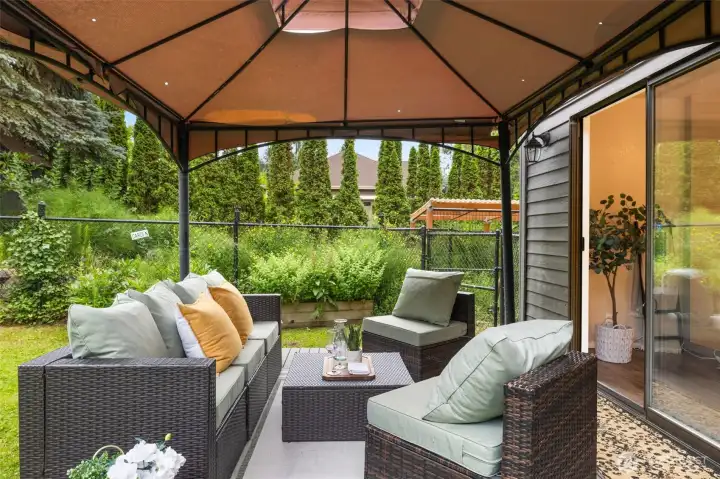 The covered patio extends the living space through every season.