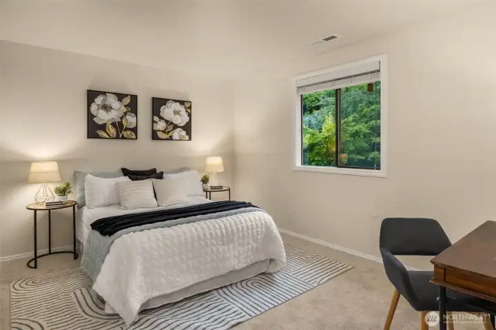 Another spacious bedroom filled with natural light. Bedroom #3