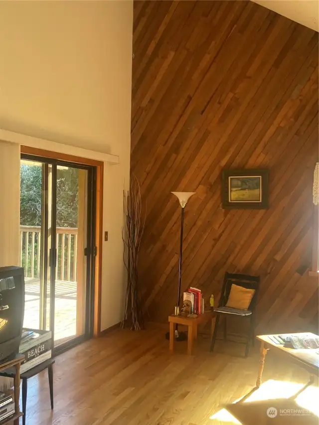 Living room with sliding door to the deck