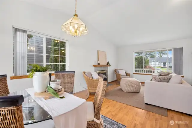 Looking from the dining room toward the living room with the front sitting porch beyond.