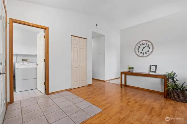 The front entry has a defined tile area and a coat closet.