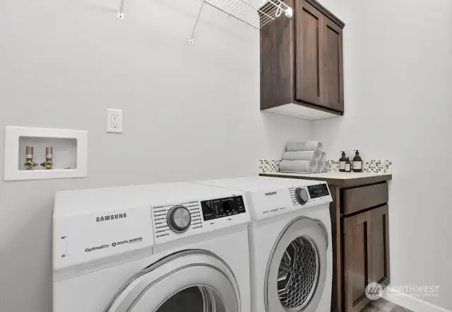 Laundry room  virtually staged for reference only. Features and finishes will vary.