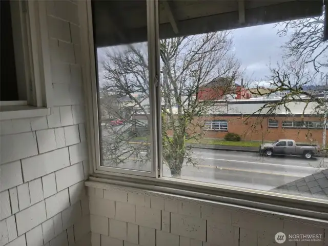 enclosed sun porch off of  primary bedroom