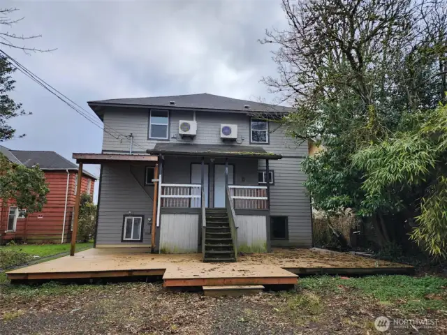 Back of duplex with parking area